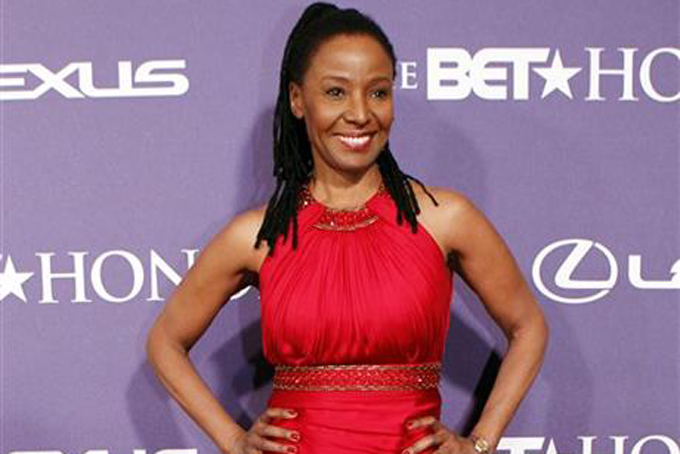 FILE - In this Jan. 14, 2012 file photo, former model and restaurateur B. Smith arrives at the BET Honors red carpet in the Warner Theatre in Washington. Broadway stars and singers will come together Monday, May 11, 2015, to celebrate Smith and raise money to help people with Alzheimer\'s disease. B. Smith, became one of the first African-American models on the cover of Mademoiselle and later opened restaurants, revealed last year that she has Alzheimer\'s disease. (AP Photo/Jose Luis Magana, File)