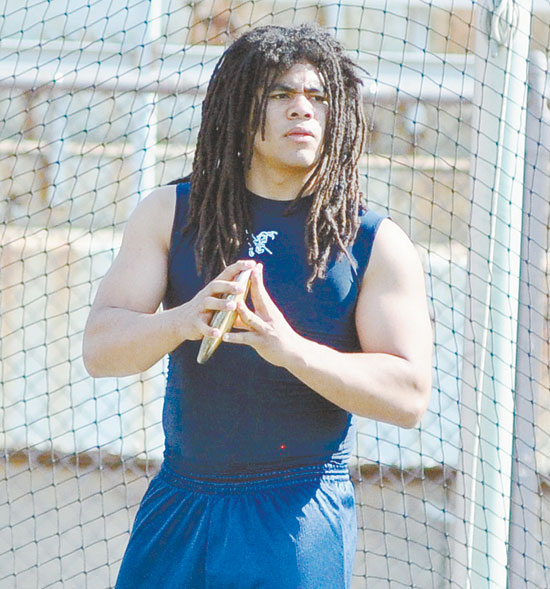 HEAVY LIFTER—Hakeim McKenzie of Carrick won the discus event and won the shot put event for the third year in a row, Hakeim, will attend Clairon University in the fall and play football for them 
