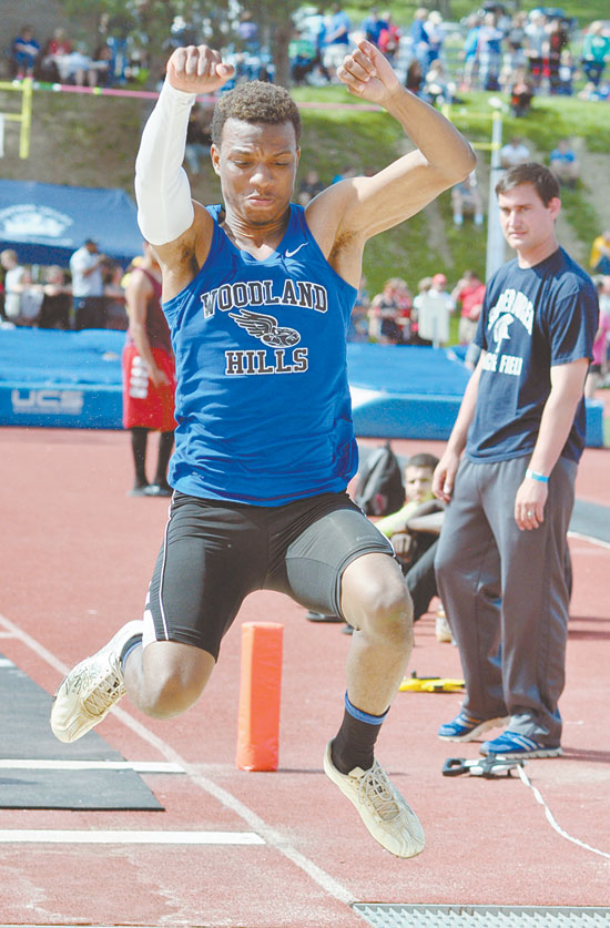 ISAIAH BROOKS of Woodland Hills won the WPIAL AAA Long Jump and Triple Jump and to finish off his outstanding day won the 200-meter dash. 