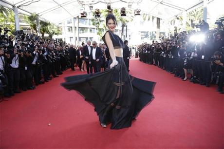Kendall Jenner poses for photographers upon arrival at the screening of the film Youth at the 68th international film festival, Cannes, southern France, Wednesday, May 20, 2015. (AP Photo/Thibault Camus)