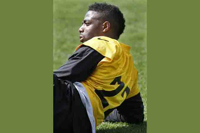 In this May 28, 2015, file photo, Pittsburgh Steelers cornerback William Gay (22) stretches before participating in organized team activity in Pittsburgh. Following the retirement of Ike Taylor and Troy Polamalu, Gay finds himself as the veteran voice of reason in a secondary in the midst of a youth movement. (AP Photo/Keith Srakocic, File)