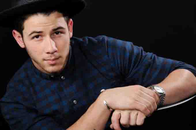 In this Oct. 29, 2014 photo, recording artist and actor Nick Jonas poses for a portrait in Los Angeles to promote his self-titled album, out Nov. 11. (Photo by Chris Pizzello/Invision/AP) (The Associated Press)