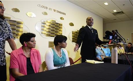Cannon Lambert Sr. the attorney for the family of Sandra Bland addresses the media during a news conference at Dupage African Methodist Episcopal Church on Wednesday, July 22, 2015, in Lisle, Ill. (AP Photo/Matt Marton)