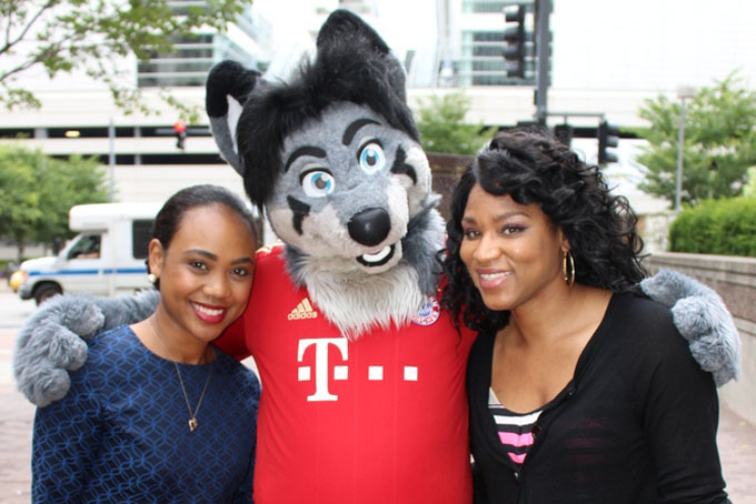 Clarissa Beckles from East Liberty and Melanie Reid from Highland Park came down on their lunch break to see the furries last year. (Photo by J. L. Martello/File)
