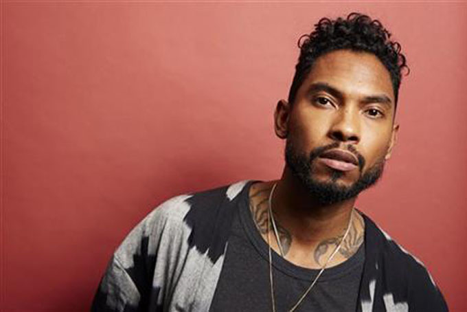 In this July 1, 2015 photo, singer Miguel poses for a portrait to his new album "Wildheart", in New York. (Photo by Dan Hallman/Invision/AP)