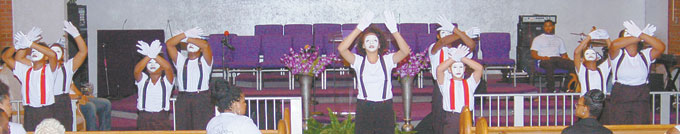 Kingdom Come Ministries performs a mime. The North Side Institutional COGIC Young Adults Choir also performed.