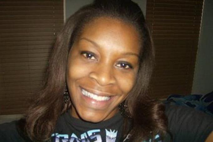 In this undated photo provided by the Bland family, Sandra Bland poses for a photo. The family of Bland, who was found dead in her Texas jail cell, assert that she would not have taken her own life, but authorities are pointing to mounting evidence that they say shows she hanged herself. (Courtesy of Bland family)