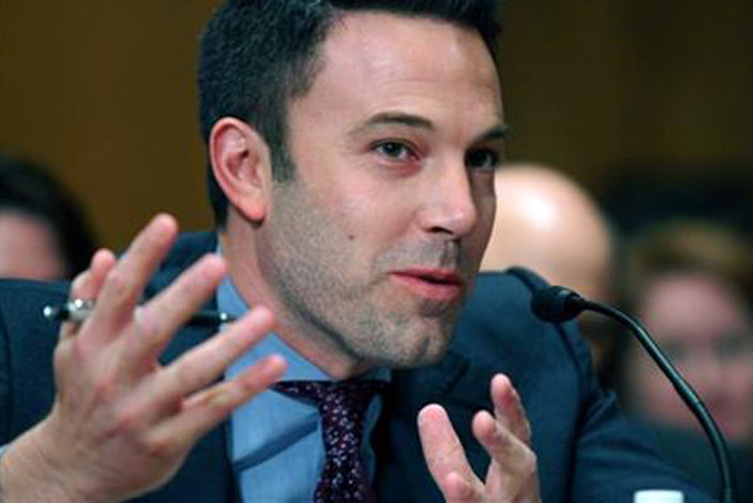 FILE - In this March 26, 2015 file photo, actor Ben Affleck testifies on Capitol Hill in Washington before the Senate State, Foreign Operations, and Related Programs subcommittee hearing on diplomacy, development and national. security. "Finding Your Roots" will return for season three, but whether the celebrity genealogy series that buried an uncomfortable fact about Affleck's ancestor continues after that remains in doubt, PBS' chief executive said.(AP Photo/Lauren Victoria Burke)