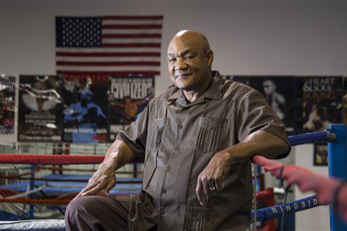 In a Thursday, July 23, 2015 photo, George Foreman, former heavyweight boxing champion who is now a minister, poses for a portrait at the George Foreman Youth Center in Houston. In Foreman's bout against sin as pastor of north Houston's Church of the Lord Jesus Christ, he's still a powerhouse slugger. (Brett Coomer/Houston Chronicle via AP ) 