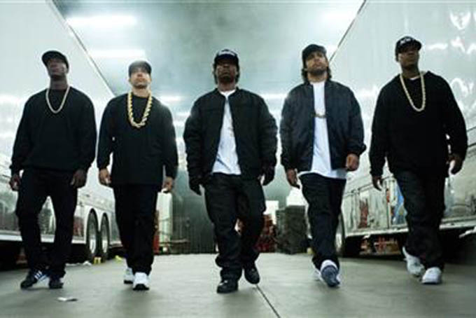  This photo provided by Universal Pictures shows, Aldis Hodge, from left, as MC Ren, Neil Brown, Jr. as DJ Yella, Jason Mitchell as Eazy-E, O’Shea Jackson, Jr. as Ice Cube and Corey Hawkins as Dr. Dre, in the film, “Straight Outta Compton." The movie releases in U.S. theaters on Aug. 14, 2015. (Jaimie Trueblood/Universal Pictures via AP)