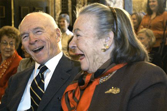 In this Dec. 6, 2007, file photo, philanthropist and political activist Elsie Hillman, right, and her billionaire industrialist husband Henry Hillman share a laugh during a Pittsburgh news conference about the Henry J. Hillman Foundation's $5.5 million donation to bolster the Pittsburgh Symphony Orchestra's international tours. Elsie Hillman's family announced that she died at her Pittsburgh home Tuesday, Aug. 4, 2015. She was 89. (AP Photo/Keith Srakocic, File)