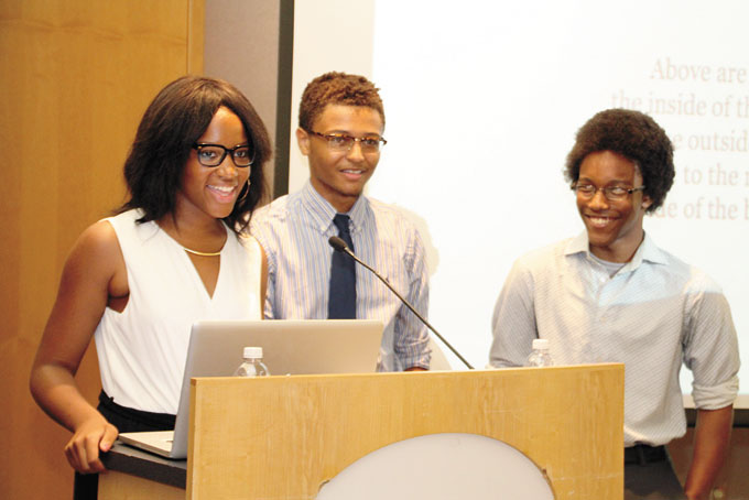PRODUCT PRESENTATION—From left: Destiny Callwood, Devaughn Wilkerson and Barrington Ratliff making product presentation. (Photo by Jackie McDonald)
