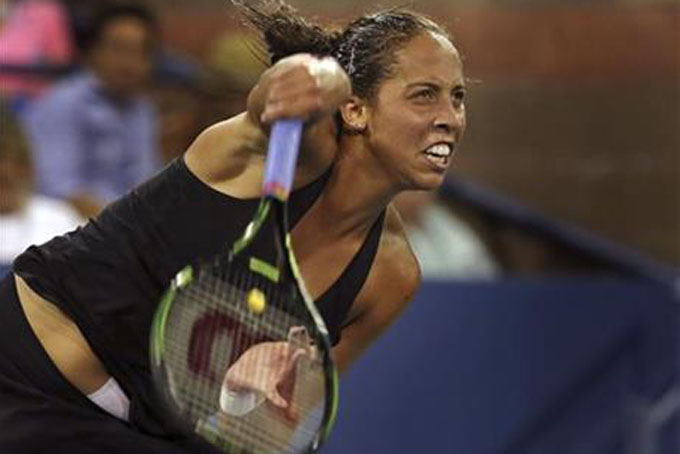 Madison Keys of the United States serves to Agnieszka Radwanska, of Poland, during the third round of the U.S. Open tennis tournament, Friday, Sept. 4, 2015, in New York. (AP Photo/Adam Hunger)