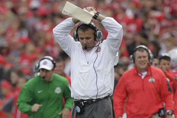 Ohio State head coach Urban Meyer reacts to missing a fourth down conversion against Northern Illinois during the second quarter of an NCAA college football game Saturday, Sept. 19, 2015, in Columbus, Ohio. Ohio State won 20-13. (AP Photo/Jay LaPrete)