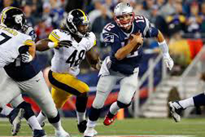 Bud Dupree chased down Patriots quarterback Tom Brady for a sack in the Steelers' opener. (Winslow Townson/AP)