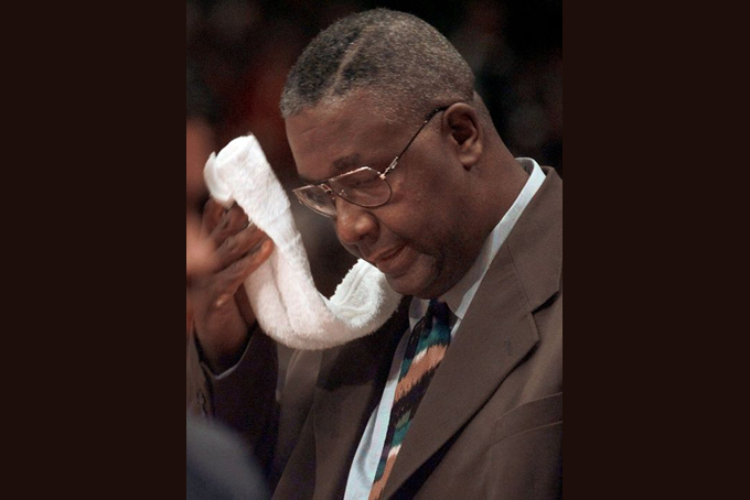 Former Georgetown coach John Thompson never was very far from his towel when he ruled Big East basketball, as in this 1998 season.(Photo: Mark Lennihan, AP)