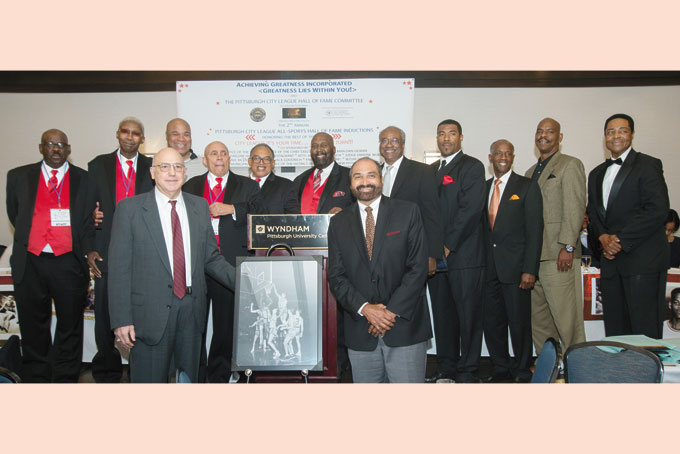 BEYOND THE CITY—Pittsburgh City League All Sports Champions who went on to become champions in their respective sport in college, and or the pros, with Steelers great Franco Harris, front center, and Bill Neal back center. (Photos by Gail Manker) 