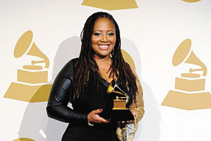 LALAH HATHAWAY WITH ONE OF HER GRAMMYS (AP Photo)