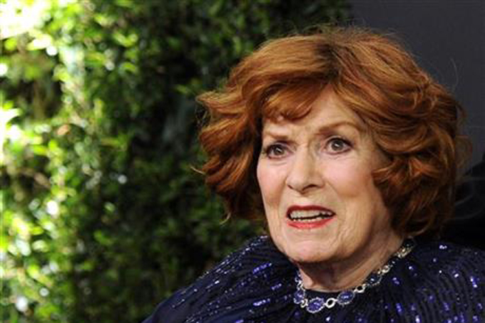 FILE - This Nov. 8, 2014 file photo Maureen O'Hara arrives at the 6th annual Governors Awards at the Hollywood and Highland Center in Los Angeles. O'Hara,who appeared in such classic films as "The Quiet Man” and How Green Was My Valley," has died. Her manager says O’Hara died in her sleep Saturday, Oct. 24, 2015 at her home in Boise, Idaho. (Photo by Chris Pizzello/Invision/AP, File)