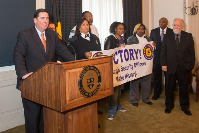 UNITED DOWNTOWN—Newly unionized employees from several security firms join Mayor Bill Peduto, far left, Labor Council President Jack Shea, far right, and PIIN President Rev. Rodney Lyde, right. (Photo courtesy Renee Rosensteel)