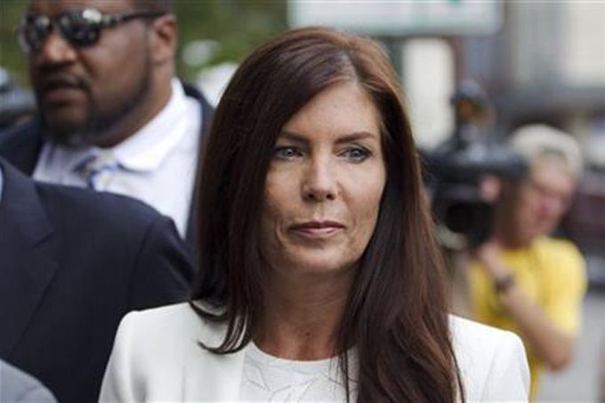 FILE - In this Aug. 8, 2015, file photo, Pennsylvania Attorney General Kathleen Kane arrives to be arraigned on charges she leaked secret grand jury material and then lied about it under oath at the Montgomery County detective bureau in Norristown, Pa. The Pennsylvania Supreme Court's temporary suspension of Kane's law license began Thursday, Oct. 22, 2015, and a day later, state senators outlined plans for a bipartisan committee to determine whether Kane should be removed from office. (AP Photo/Laurence Kesterson, File)