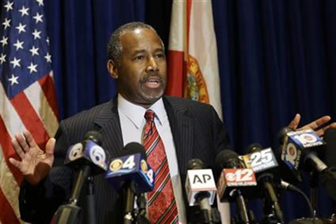 FILE - In this Nov. 6, 2015, file photo, Republican presidential candidate Ben Carson speaks during a news conference before attending a Black Republican Caucus of South Florida event benefiting the group's scholarship fund in Palm Beach Gardens, Fla. The retired neurosurgeon said on several Sunday, Nov. 8, talk shows that he’s being scrutinized more closely than any other presidential candidate. (AP Photo/Alan Diaz, File)