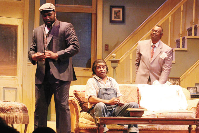 CAST—From left:  Monteze Freeland, Wali Jamal, seated, and Garbie Dukes. 