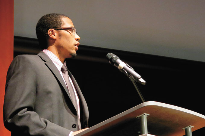 GRATEFUL GRADUATE—Travis Wilkins, a 2008 Allderdice alum, thanks the Promise for giving him a shot at college and the life he now lives as an investment services specialist for BNY Mellon. (Photos by Deanna Garcia/90.5 WESA)