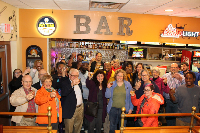 Everyone sharing a toast after the ribbon cutting. (Photo by J.L. Martello)