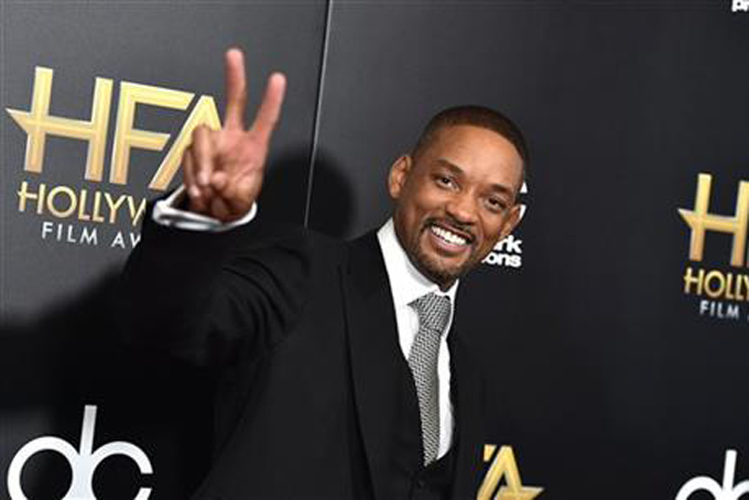 Will Smith arrives at the Hollywood Film Awards at the Beverly Hilton Hotel on Sunday, Nov. 1, 2015, in Beverly Hills, Calif. (Photo by Jordan Strauss/Invision/AP)