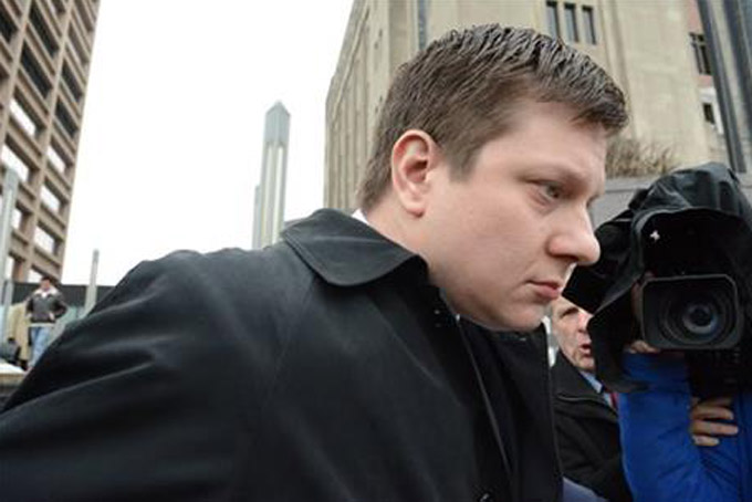 Chicago Police Officer Jason Van Dyke leaves the Criminal Courts Building Tuesday, Dec. 29, 2015, in Chicago. Van Dyke pleaded not guilty to murder charges in the 2014 shooting of 17-year-old Laquan McDonald during his arraignment. Van Dyke, who is no longer being paid, has been free since posting bond. (Brian Jackson/Chicago Sun-Times via AP)