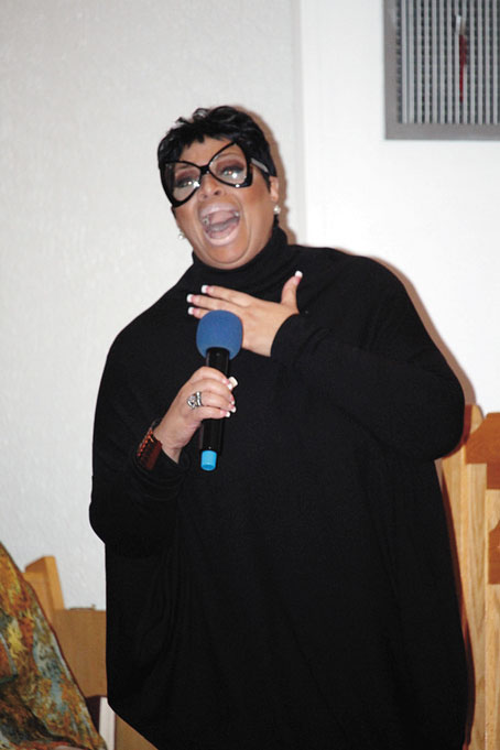DEBORAH MONCRIEF, the special guest soloist, singing one of her own pieces.