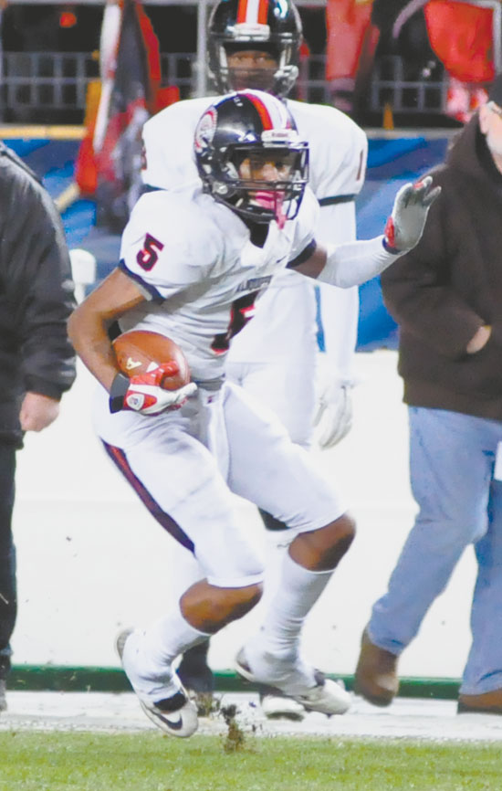 JASSIR JORDAN (5) Aliquippa, rushed for one touchdown and threw the winning touchdown pass to teammate Thomas Perry on a half back option play for the Quips 44-38 win. 