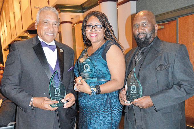 Brother Ronald Lawrence, Celeste Smith (accepting for husband, Jasiri X) and Bill Neal.