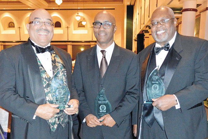 AWARDEES—Chris Moore, Howard Russell, KSEF president, and Sala Udin.