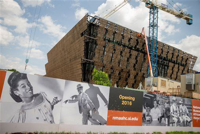 FILE - In this June 9, 2015 file photo, construction continues on The Smithsonian's National Museum of African American History and Culture in Washington. The building is scheduled to open in 2016. (AP Photo/Andrew Harnik)
