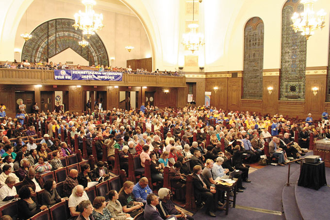 NEAR PACKED HOUSE—The church, which seats 1,200 people, had very few empty seats. (Photos by J. L. Martello)