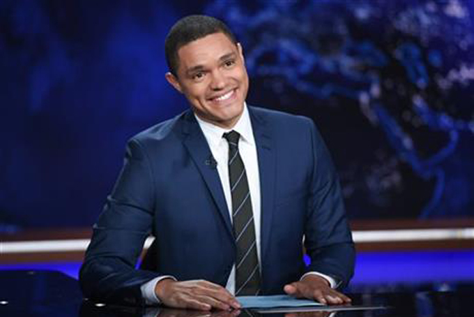 FILE - In this Sept. 29, 2015 file photo, Trevor Noah appears during a taping of "The Daily Show with Trevor Noah" in New York. Noah replaced host Jon Stewart, who left the show in July. (Photo by Evan Agostini/Invision/AP, File)