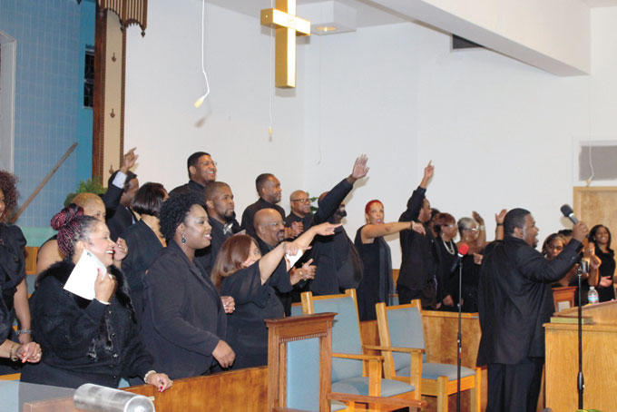PRAISING GOD THROUGH SONG—The Greater Allegheny Choral Chapter presented Parrish Davenport & Family and Friends Fellowship Choir at its “An Evening of Extreme Worship” concert at Sixth Mt. Zion Baptist Church in East Liberty. The Disciples of Mime were the special guests. Pictured above, Parrish Davenport & Family and Friends Choir performing a selection. (Photos by J. L. Martello)