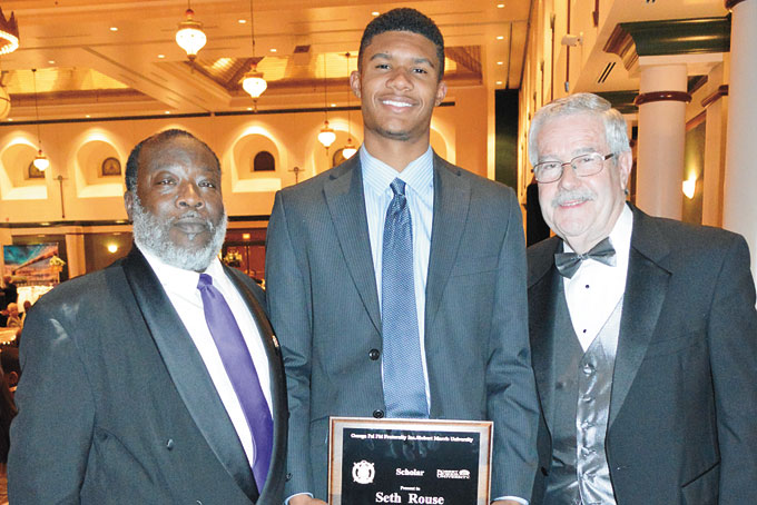 ROBERT MORRIS SCHOLAR—Kenneth Minefield, Seth Rouse, recipient of 4-year scholarship to Robert Morris University and David Jamison, PhD, interim president of Robert Morris University.