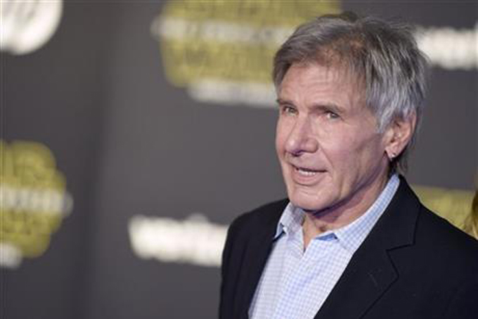 Harrison Ford arrives at the world premiere of "Star Wars: The Force Awakens" at the TCL Chinese Theatre on Monday, Dec. 14, 2015, in Los Angeles. (Photo by Jordan Strauss/Invision/AP) 