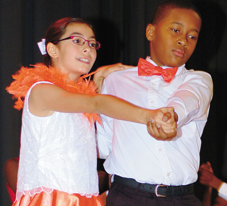 TANGO—Trinity Scott, left, and Quincy Peterson. 