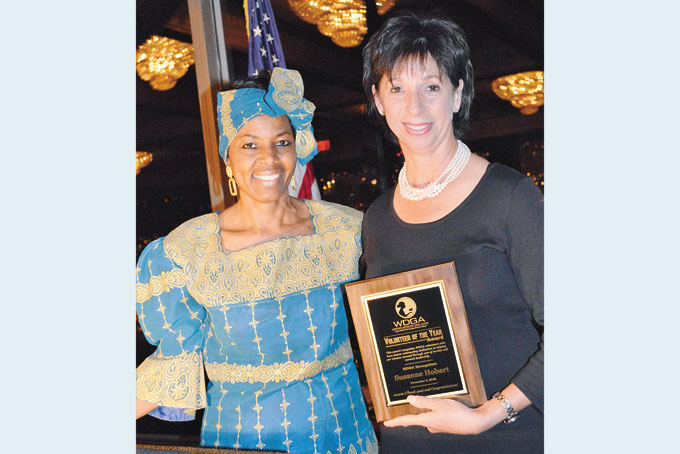VOLUNTEER OF THE YEAR—Niecy Dennis White, WDGA founder and president, left, and Sue Hobart.