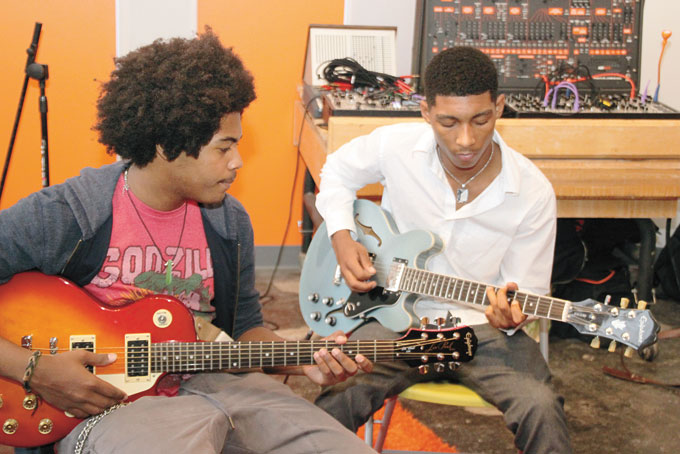 INK—Raynard Lucas, left, and Robert Rose-Thompson, right, work to perfect their performance as “Ink.” 