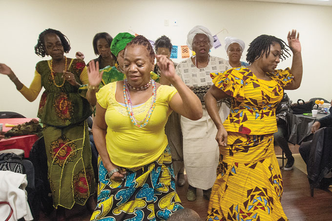 COMMUNITY MEMBERS ended the Ujamaa Collective’s Kwanzaa 2015 with a special dance.