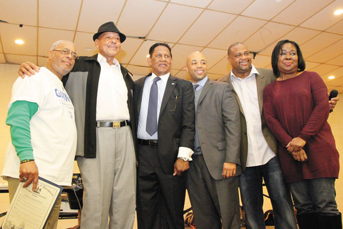 COMMUNITY LEADERS—Ed Gainey striking a holiday pose with community leaders and business owners. 