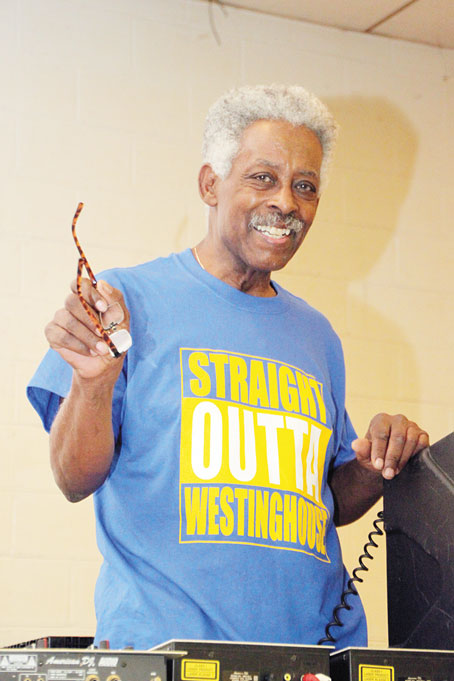 DJ LOUIE BATES—Providing the Christmas musical beat.