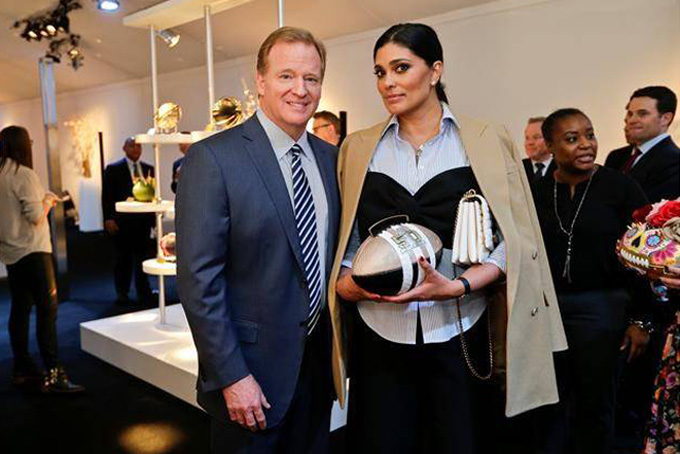 NFL Commissioner Roger Goodell, left, and fashion designer Rachel Roy pose at the unveiling of the CFDA Footballs Wednesday, Jan. 20, 2016, at the NFL headquarters in New York. In celebration of Super Bowl 50 and in support of the NFL Foundation, the NFL and the Council of Fashion Designers of America have collaborated on 50 Bespoke Designer Footballs created by CFDA Members. (AP Photo/Frank Franklin II)