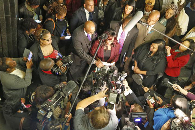 Jannie Ligons, center, a victim of former Oklahoma City police officer Daniel Holtzclaw, speaks to members of the media at the Oklahoma County Courthouse after his sentencing, Thursday, Jan. 21, 2016, in Oklahoma City. Holtzclaw, convicted of raping and sexually victimizing eight women on his beat, was sentenced Thursday to 263 years in prison. (Steve Gooch/The Oklahoman via AP) LOCAL STATIONS OUT (KFOR, KOCO, KWTV, KOKH, KAUT OUT); LOCAL WEBSITES OUT; LOCAL PRINT OUT (EDMOND SUN OUT, OKLAHOMA GAZETTE OUT) TABLOIDS OUT; MANDATORY CREDIT Read more at https://www.wral.com/news/national_world/national/image/15260044/?ref_id=15260043#YqRvpoG2ZbWrdOym.99