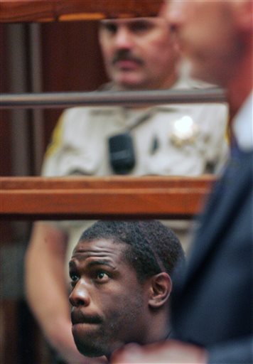 FILE - In this Aug. 23, 2005,  file photo, former National Football League running back Lawrence Phillips is shown in Superior Court in Los Angeles.  Phillips was found dead in his California prison cell early Wednesday,Jan. 13, 2016, and officials said they suspect suicide. (Anne Cusack/LA Times via AP, Pool, File)